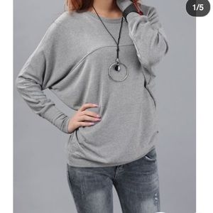 Long sleeve shirt with wing design